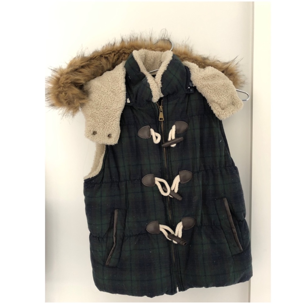 Green plaid winter vest from Coffee Shop NY.
